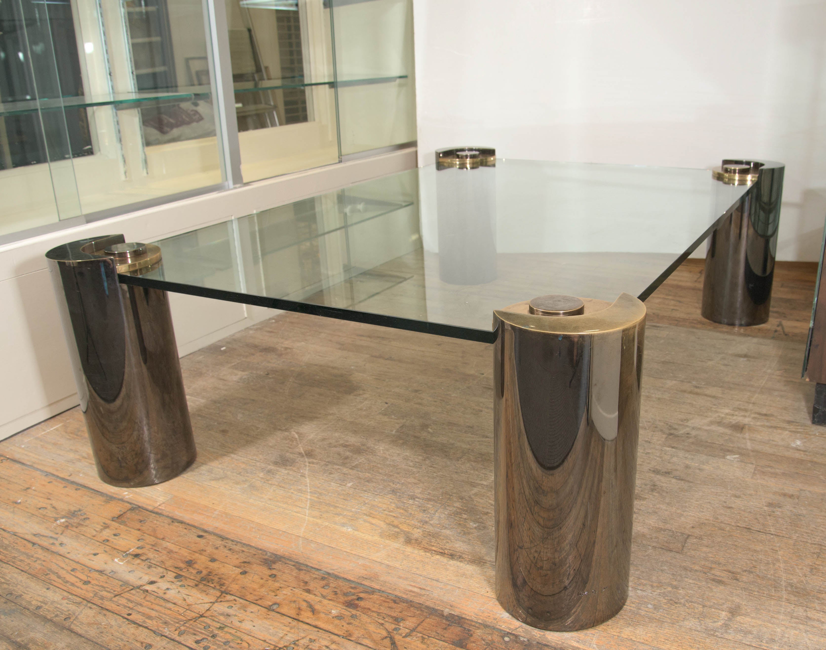 Karl Springer Glass Top Coffee Table with Cylindrical Chrome and Brass Legs