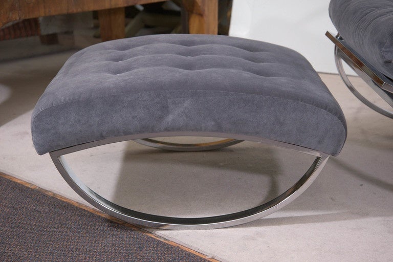 A Midcentury, highly modernistic 'Ellipse' lounge chair and ottoman, produced, circa 1970s by Italian designer Renato Zevi, in the style of Milo Baughman, each with chrome frames and rounded base, to enable rocking, and cushions upholstered in