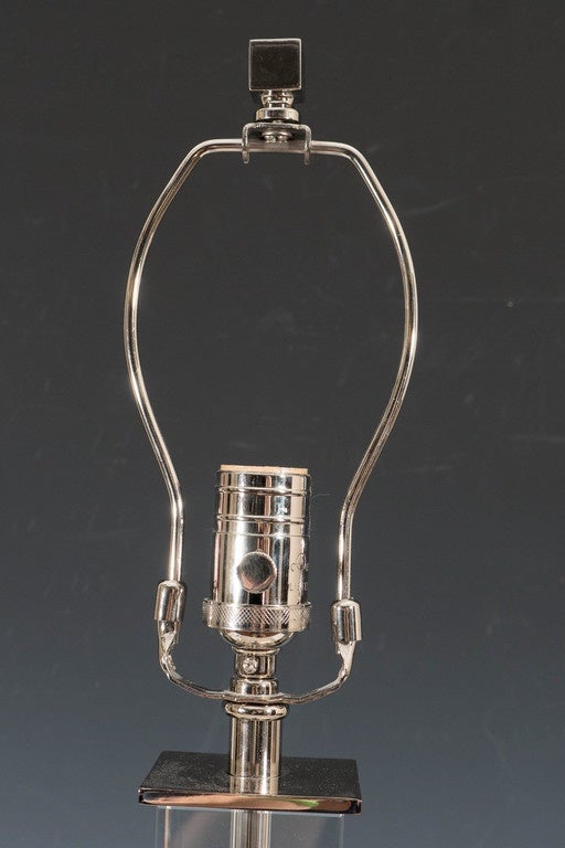 Polished Pair of T.H. Robsjohn-Gibbings Style Lucite Table Lamps on Chrome Plate Bases