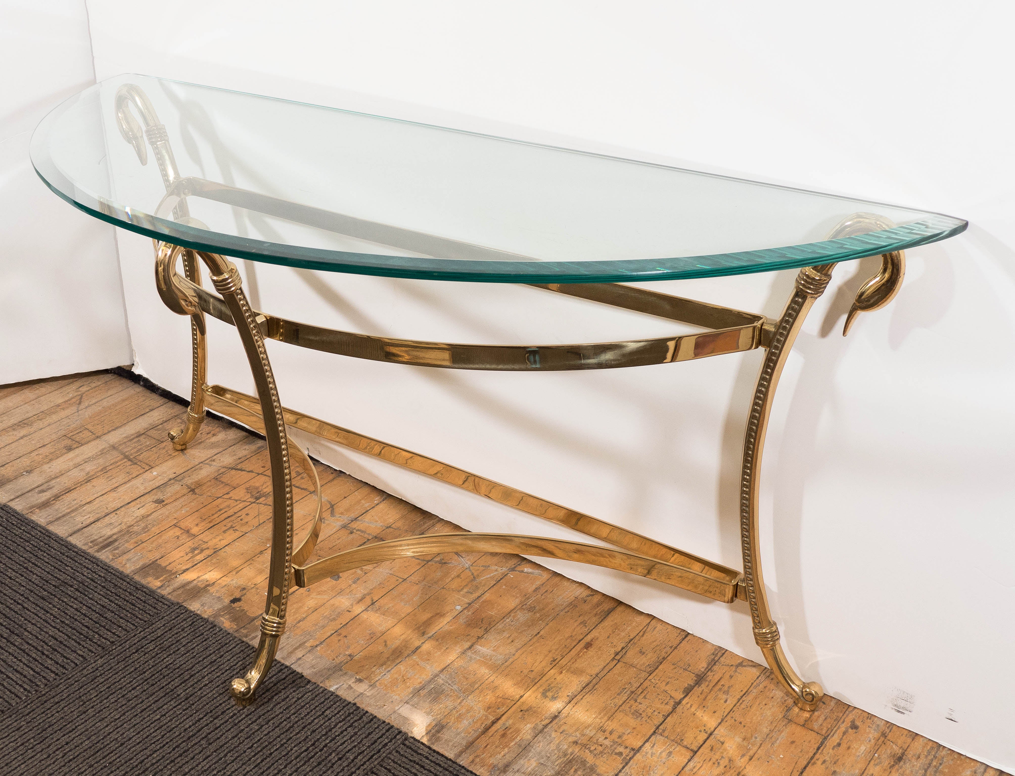 A Mid-Century Brass and Glass Top Demi-Lune Console with Swan Head Motif 1