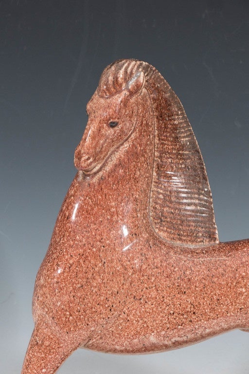 A vintage, French Art Deco sculpture of a prancing horse in glazed ceramic with speckled rouge ground, designed by one of France's top ten sculptors Alexandre Kelety, in collaboration with ceramicist Marcel Guillard, for Etling Paris, circa 1930s.