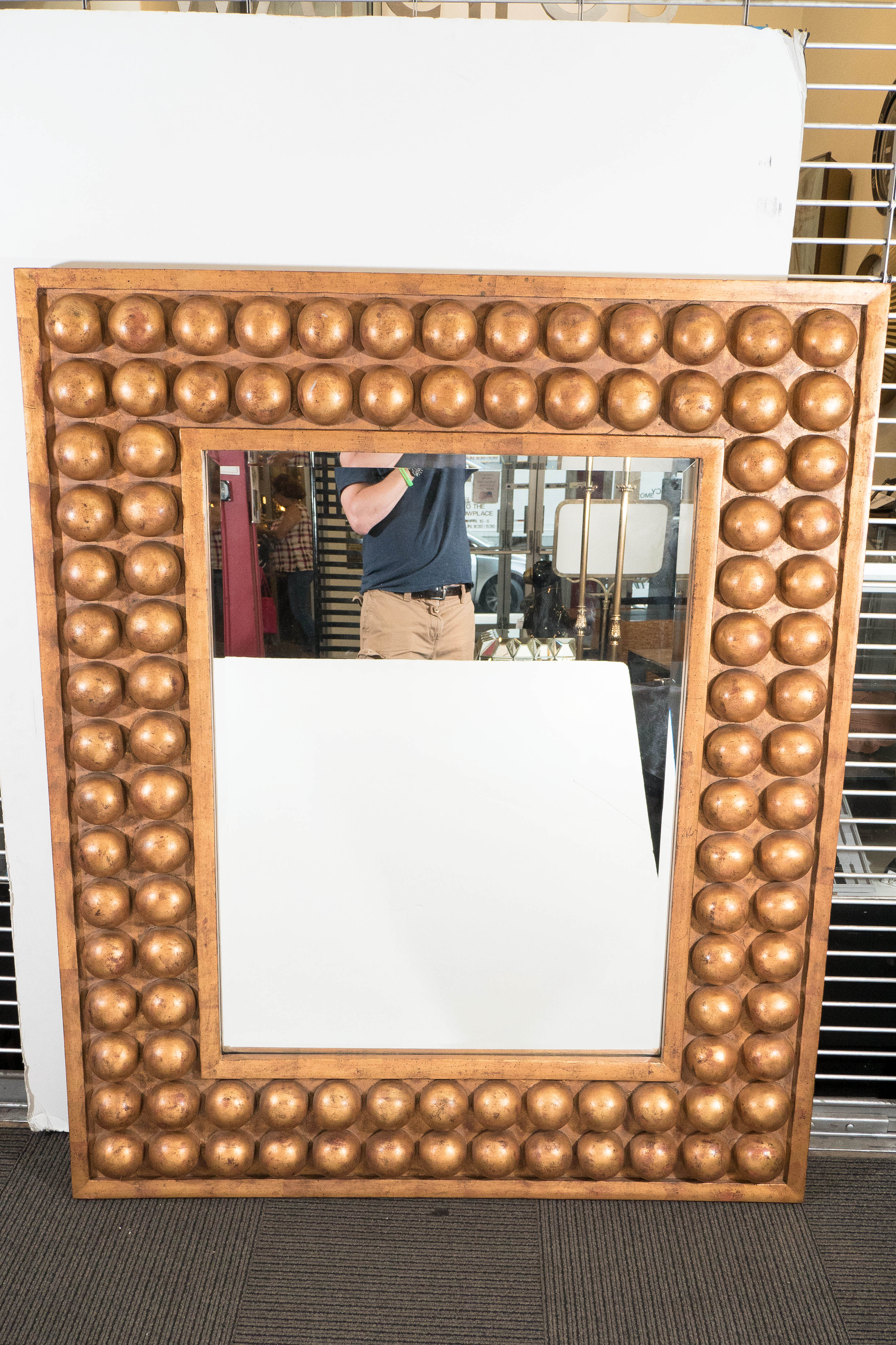 A Midcentury Italian Wall Mirror with Modernistic Giltwood Frame For Sale 1