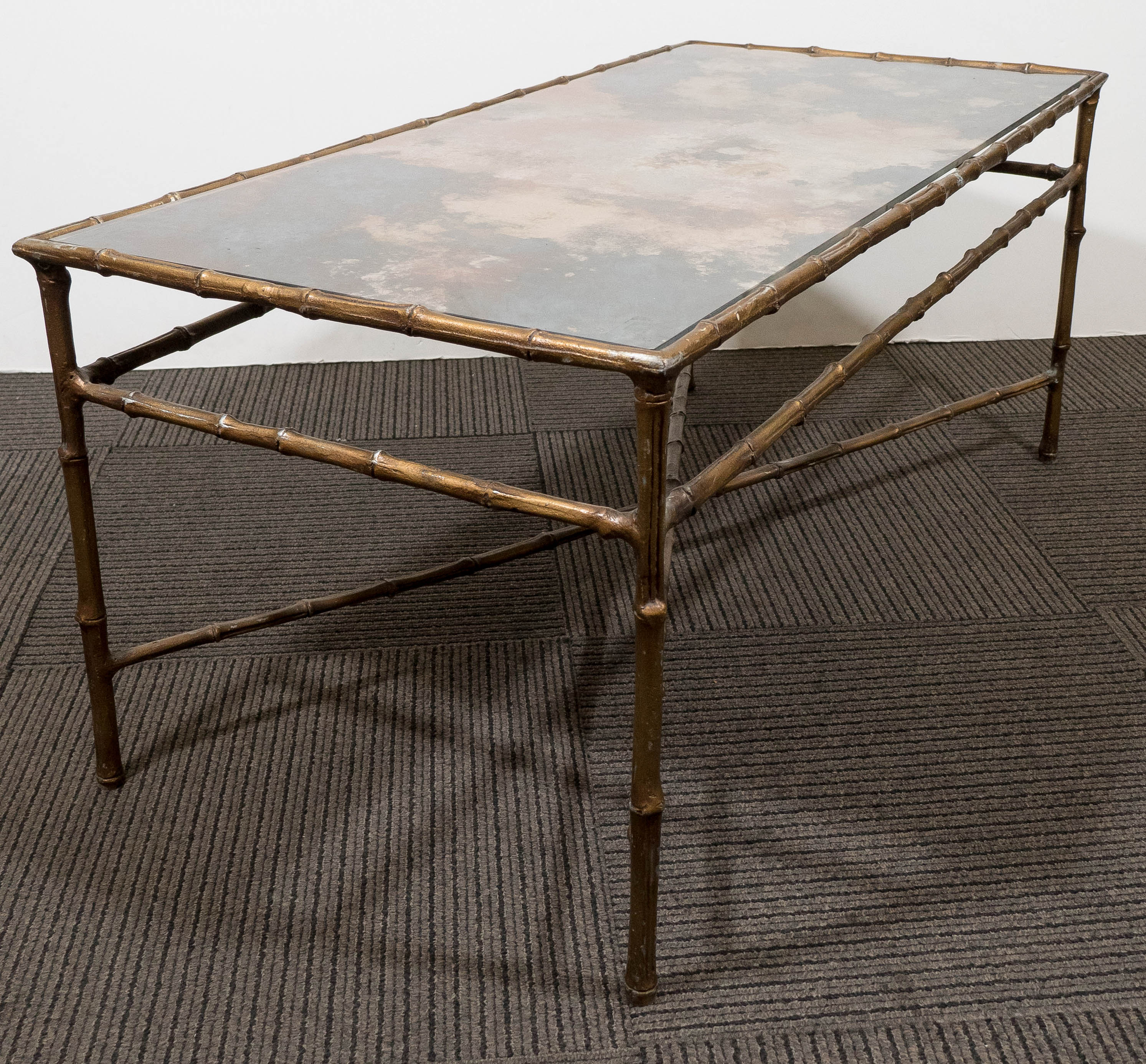 A Maison Baguès Style Faux Bamboo Brass Coffee Table with Smoked Glass Top In Good Condition In New York, NY