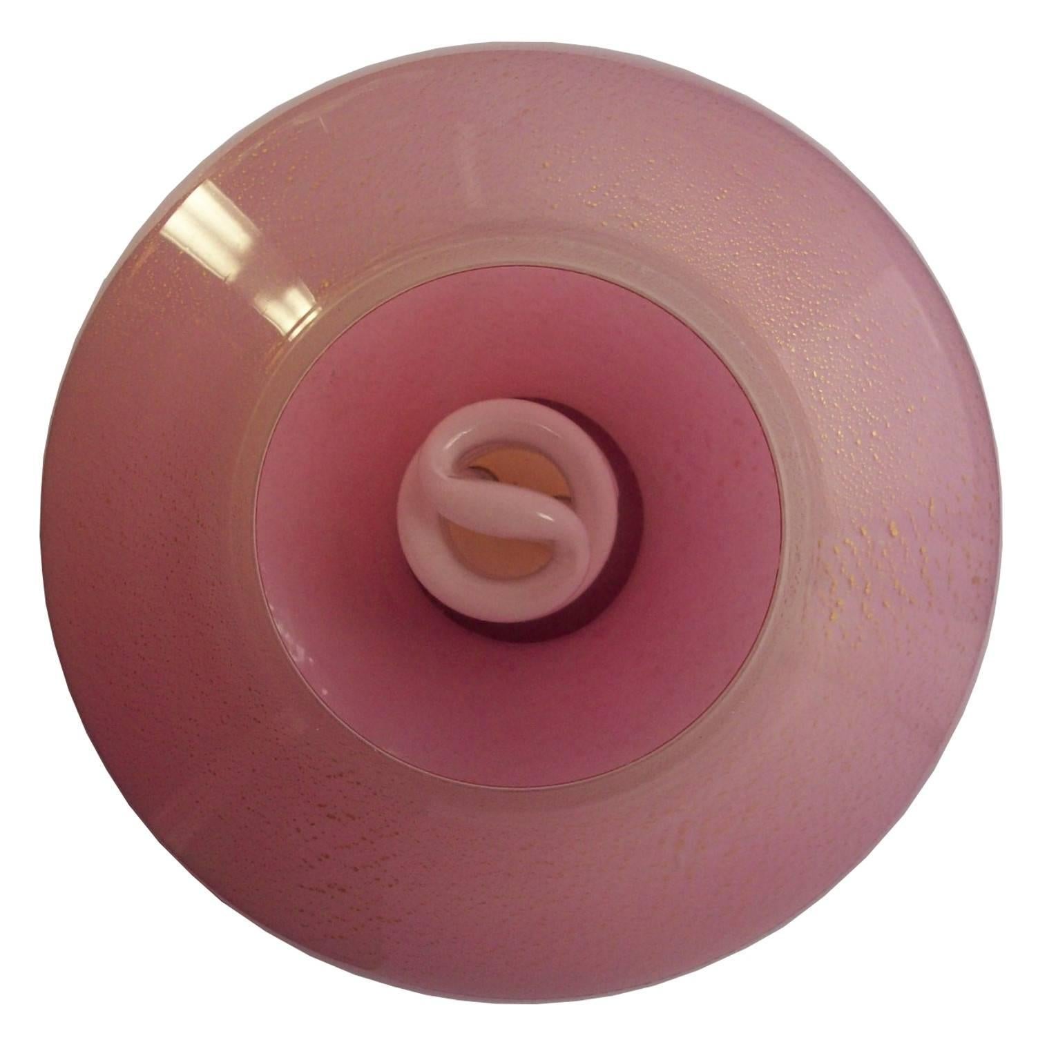 A vintage Murano glass table lamp, produced in Italy, circa 1950s by Massimo Vignelli, rendered into the highly modern 'fungo' or otherwise mushroom shape, in beautifully toned pink glass, accented with gold flecks. Very good vintage condition.

9303