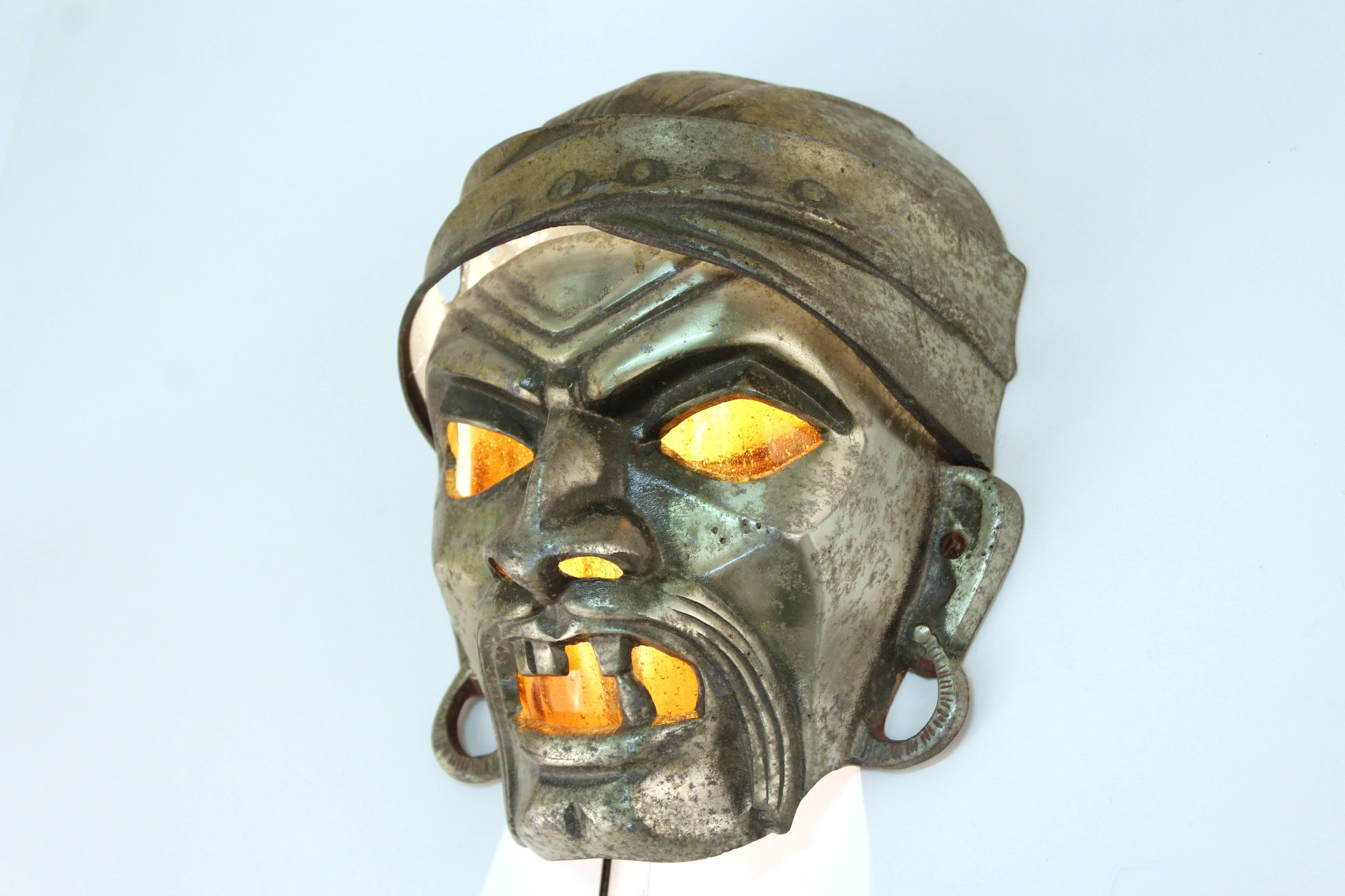 Art Deco Pair of 1930s Wall Sconces as Grotesque Masks in Cast Metal