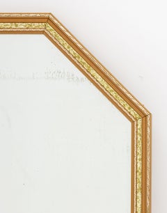 Hollywood Regency Giltwood and Faux Tortoiseshell Framed Beveled Glass Mirror