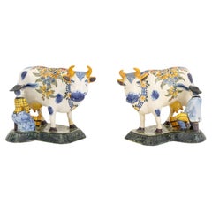 Pair of Dutch Delftware Cow and Milkmaid Figurines