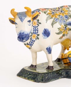 Pair of Dutch Delftware Cow and Milkmaid Figurines