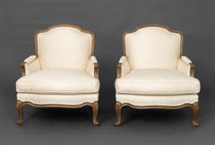 Pair of Louis XV Style Cream Diamond Pattern Fabric Upholstered Bergeres