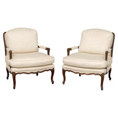 Pair of Louis XV Style Cream Fabric Upholstered Walnut Bergeres