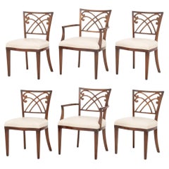 Lot de six fauteuils en acajou de style Régence avec assises en cuir beige