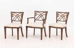 Lot de six fauteuils en acajou de style Régence avec assises en cuir beige