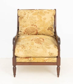 Regency Style Mahogany Caned Bergere with Beige Floral Cushions