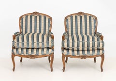 Pair of Louis XV Style Blue Velvet Upholstered Walnut Bergeres