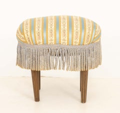 Louis XVI Style Upholstered Oval Ottoman with Tassel Fringe Border