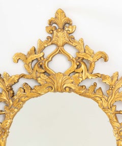 Rococo Revival Gilt Composition Framed Oval Mirror