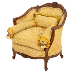 Bergère in noce rivestita in damasco di seta giallo Luigi XV