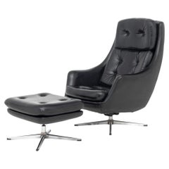 Overman Button-Tufted Black Vinyl Swivel Lounge Chair and Ottoman