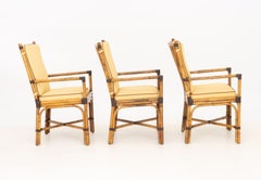 Juego de seis sillones modernos de Pierce Martin con respaldo y brazos forrados de bambú y ratán