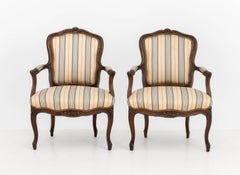 Pair of Louis XV Style Walnut Striped Linen Upholstered Fauteuils
