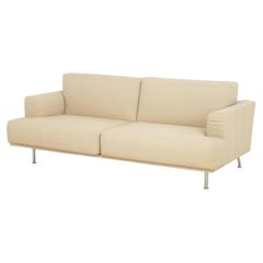 Divano "Nest" rivestito in tessuto beige, disegnato da Piero Lissoni per Cassina
