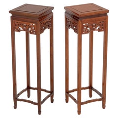 Pair of Chinese Hardwood Mythical Beast Motif Pedestal Stands