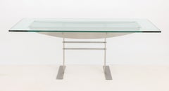 Mesa de comedor contemporánea y minimalista con tablero de cristal esmerilado