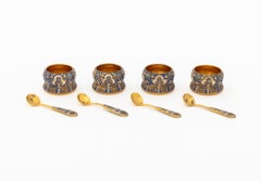 Set of Four Silver Gilt and Polychrome Enameled Open Salt Cellars and Spoons