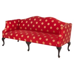 Queen Anne Style Red and Gold Upholstered Camelback Sofa