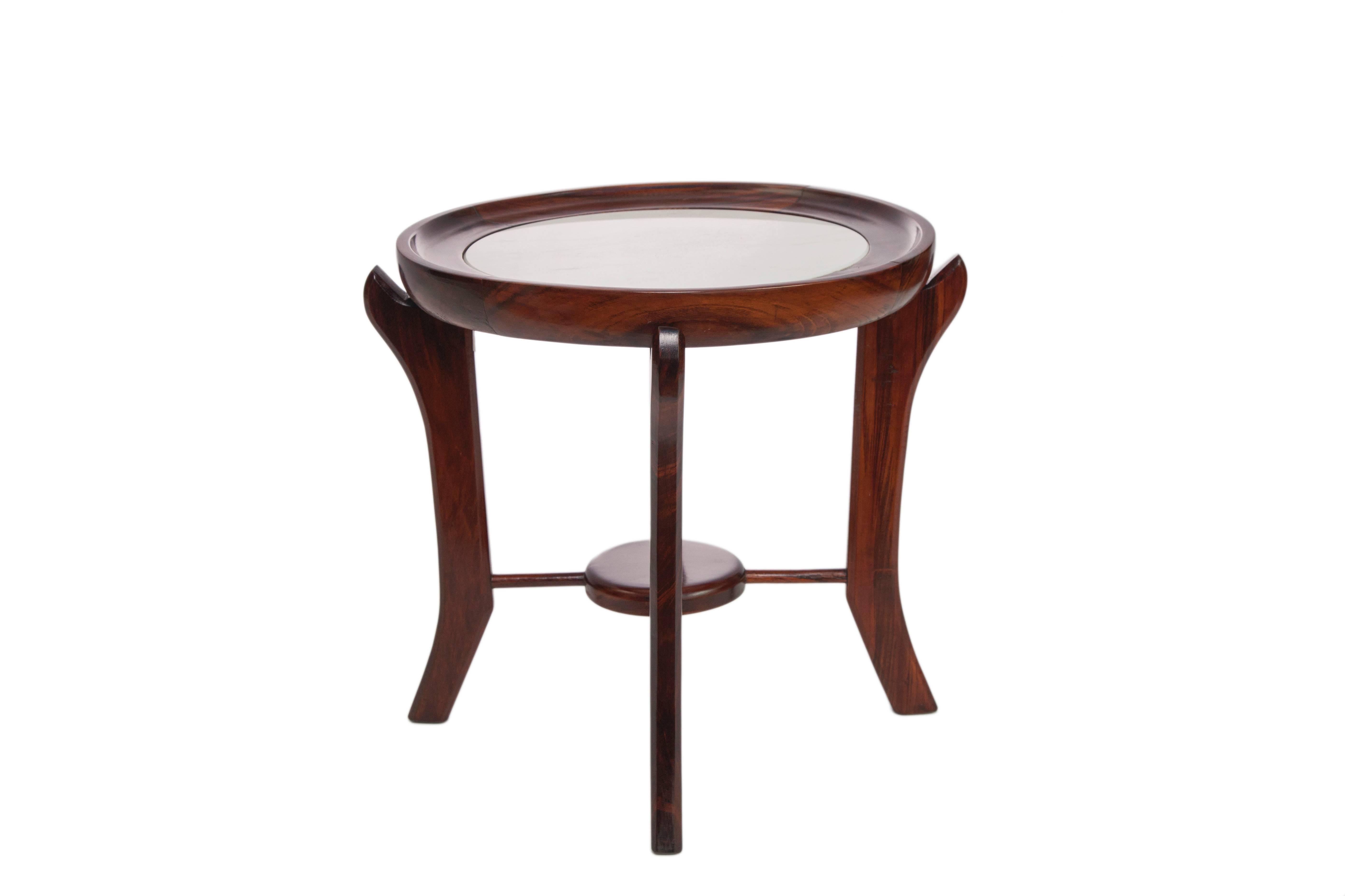 A pair of circa 1960s 'Maracanã' side tables attributed to designer Giuseppe Scapinelli, each in rich Brazilian jacaranda wood, with marble top set against round concave frame, above uniquely formed cabriole legs, with spreaders joined by a central