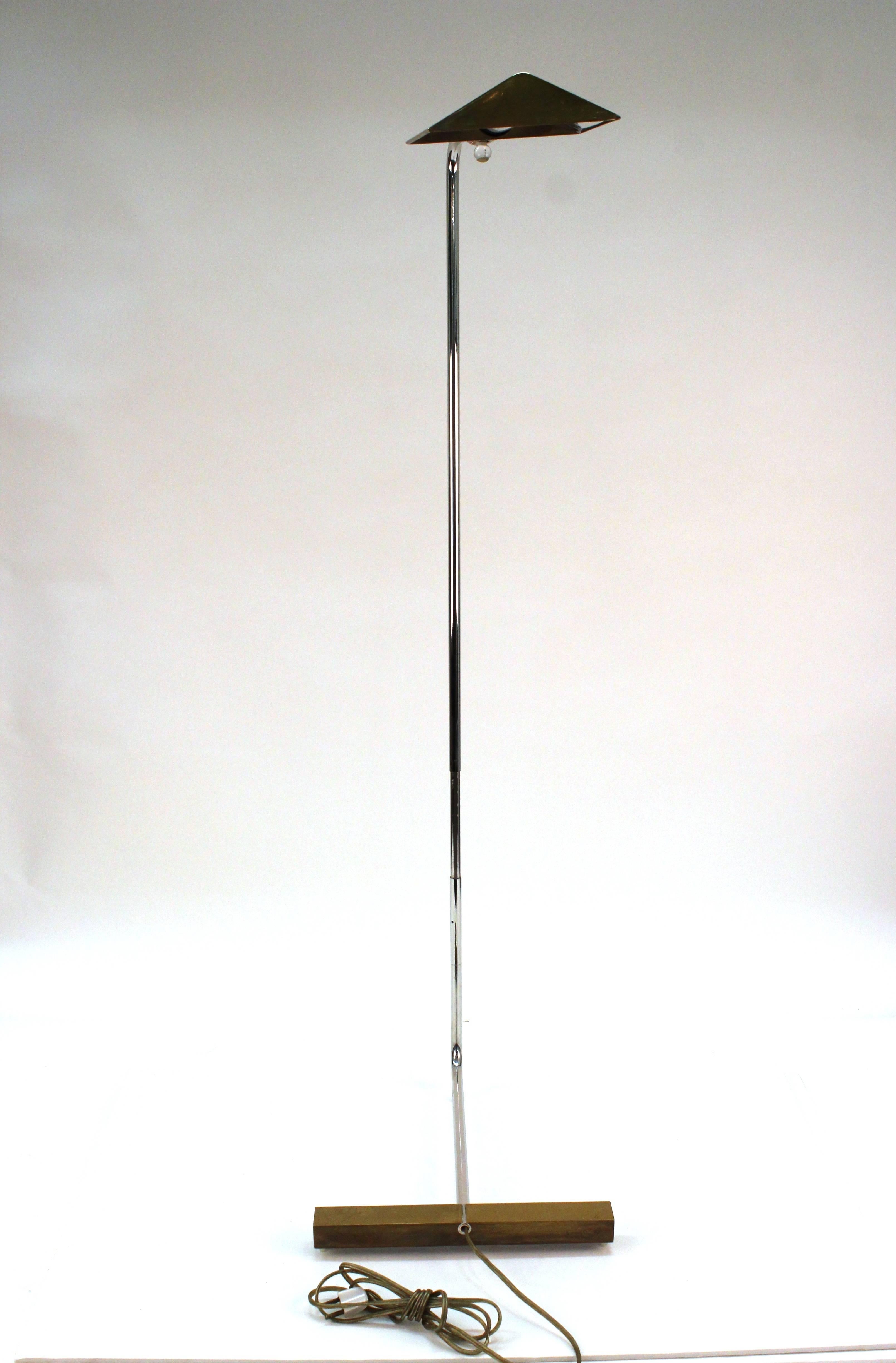 Cedric Hartman brass floor lamp in the modern Minimalist style. Includes spherical Lucite switches. Appropriate wear and original patina. In good vintage condition with a repair to the Lucite switch.