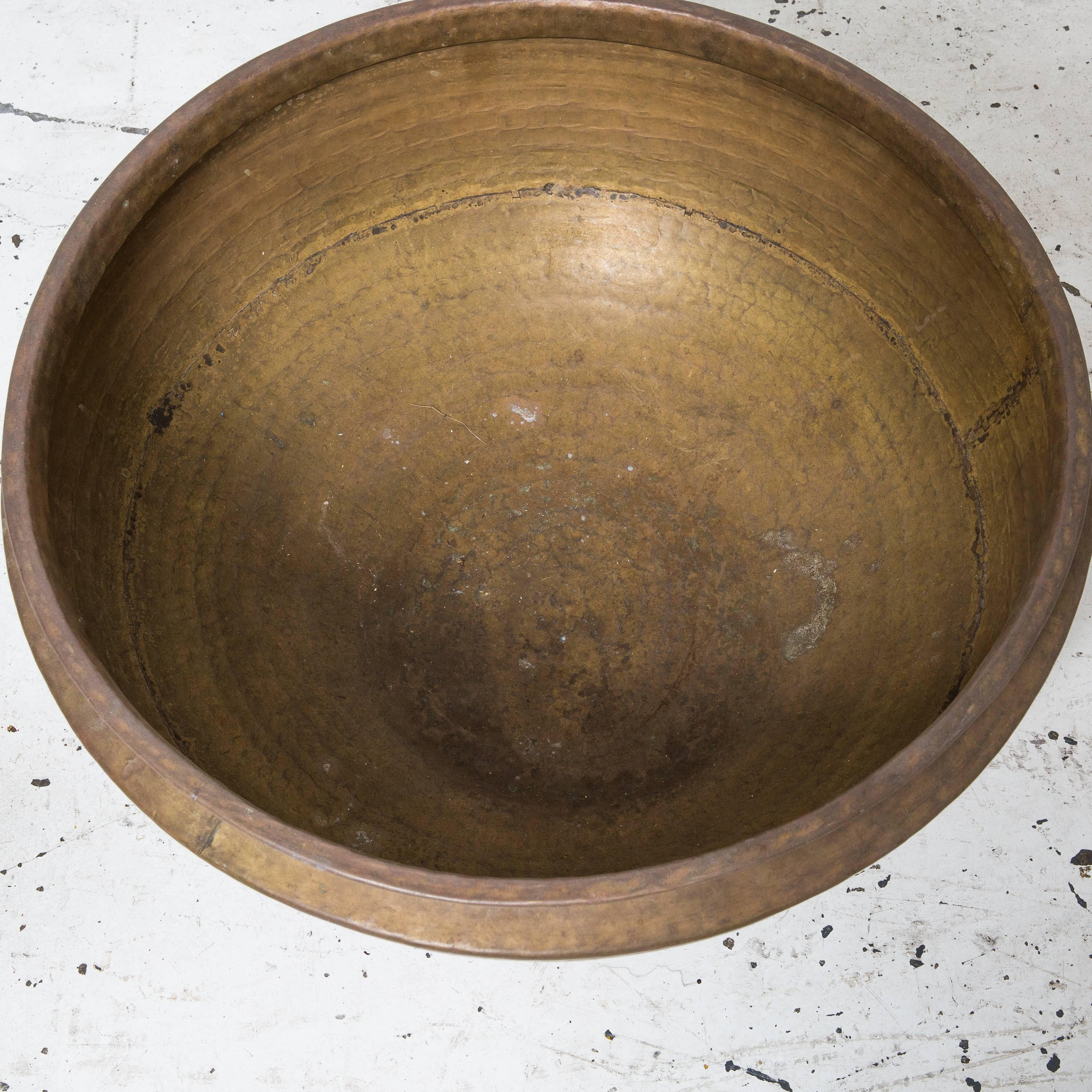 Large sized solid brass Indian pot traditionally used for cooking. Would make a great flower pot or outdoor fire pit.