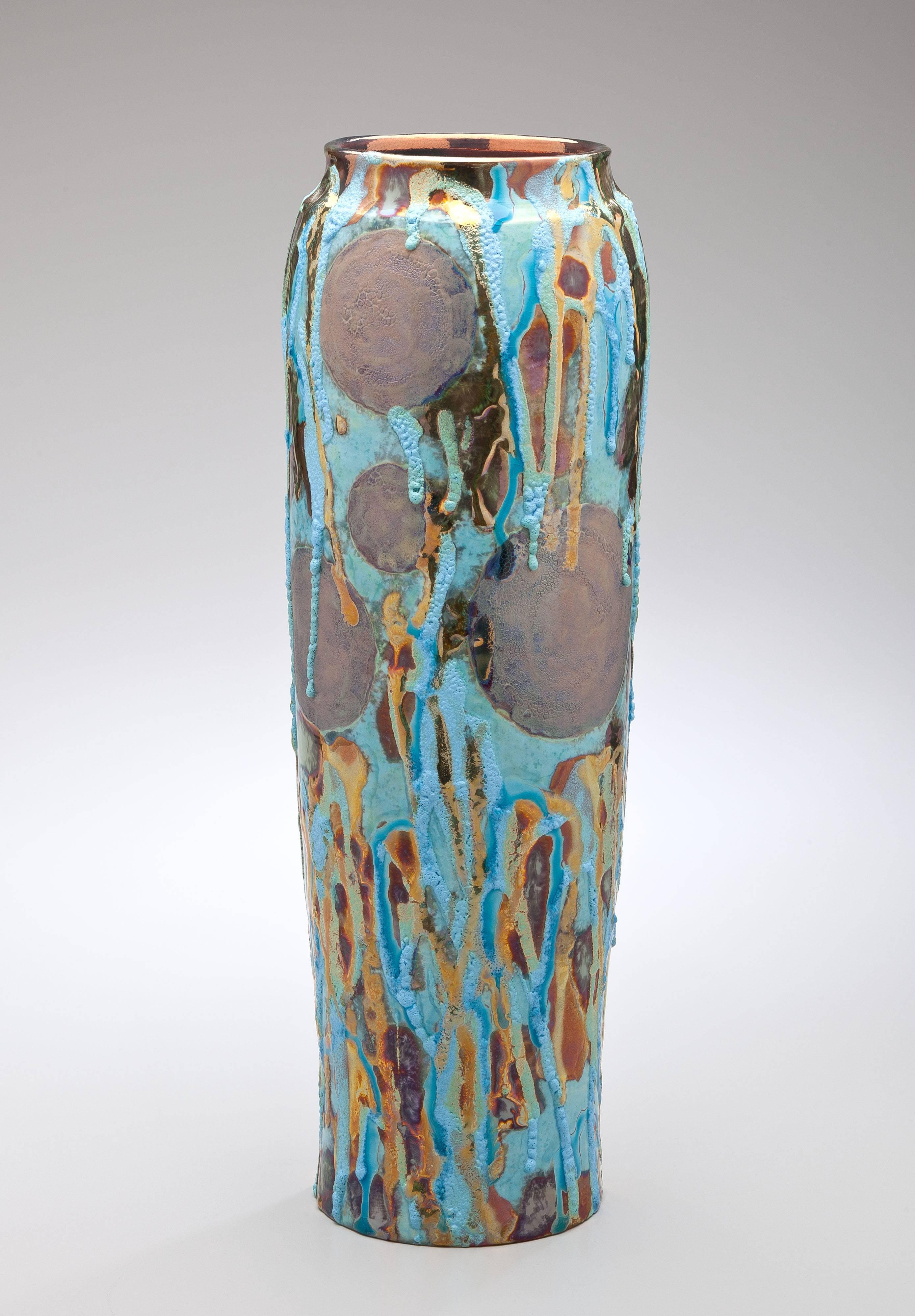 A large pottery vase by Paul Katrich with a luster glaze in blue and bronze. Katrich, a contemporary potter who works in Michigan, is noted for his luster glazes in stunning colors and combinations giving his works a sense of inner light. Katrich