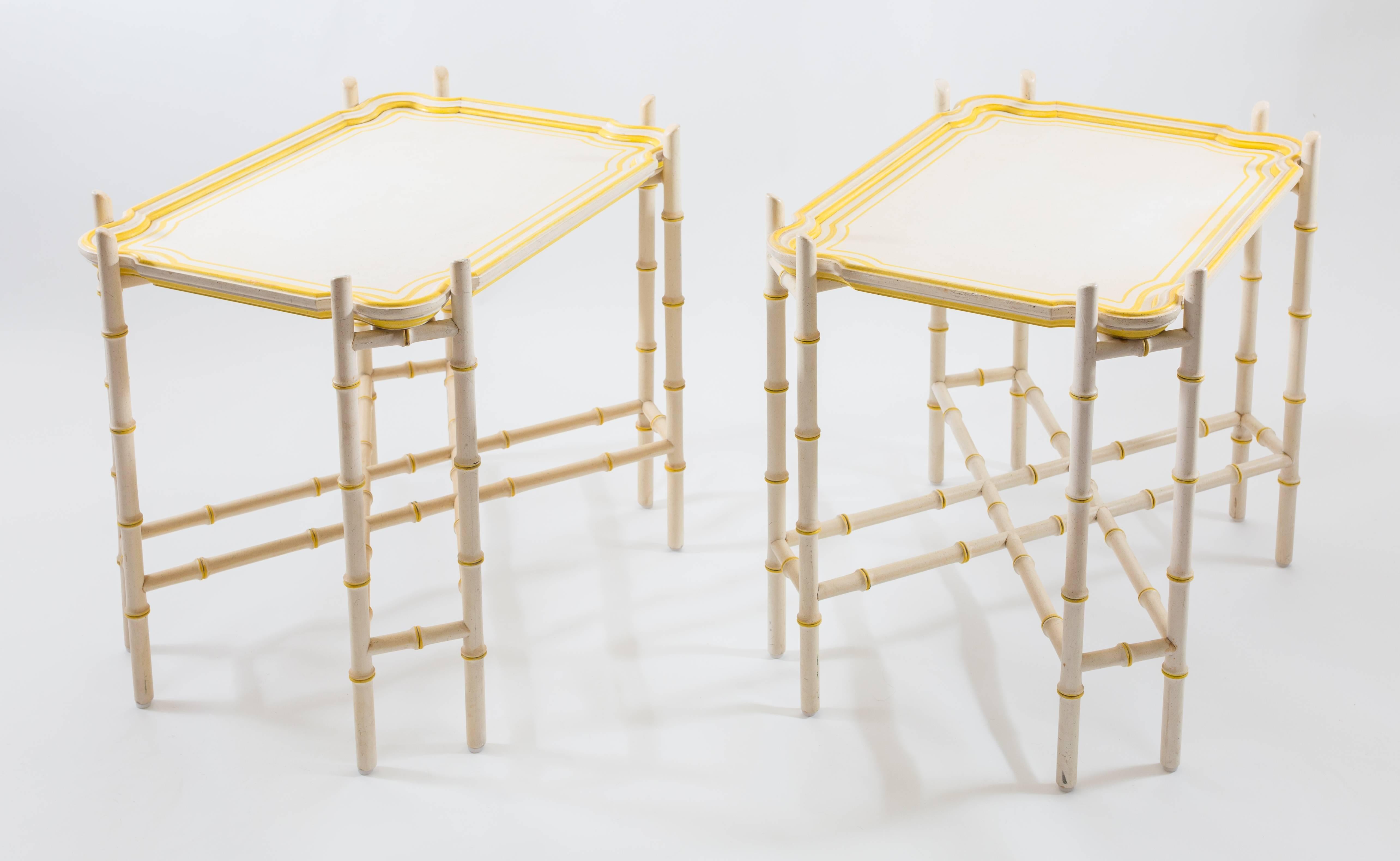 Yellow trimmed removable trays with faux bamboo bases in solid white with yellow trimmed knotches. Although tray tables, they are very sturdy. The base does not fold up which makes the surface quite solid.