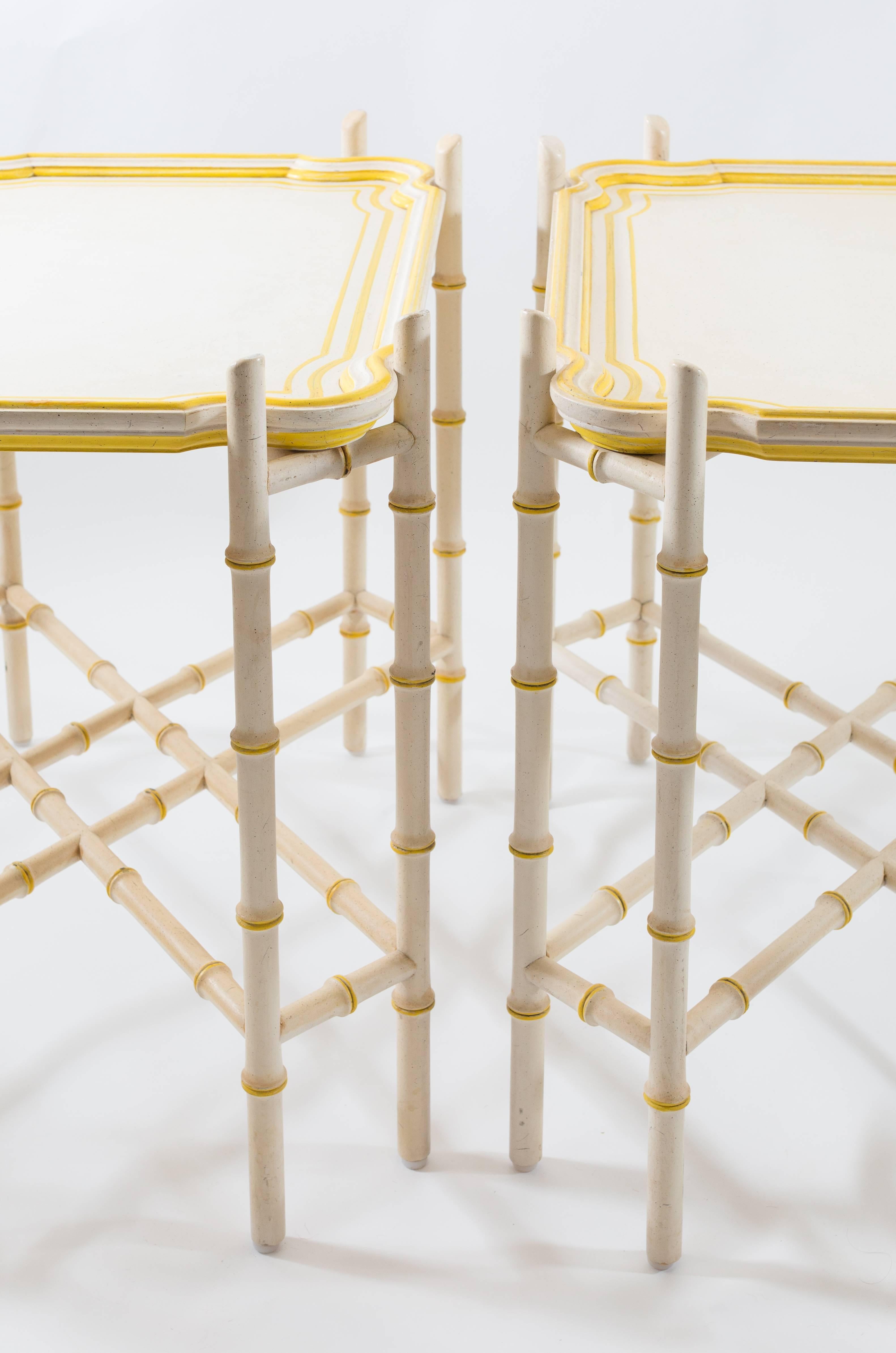 Pair of Baker Mid-Century Chinoiserie Yellow Trimmed Faux Bamboo Tray Tables In Good Condition In Asheville, NC