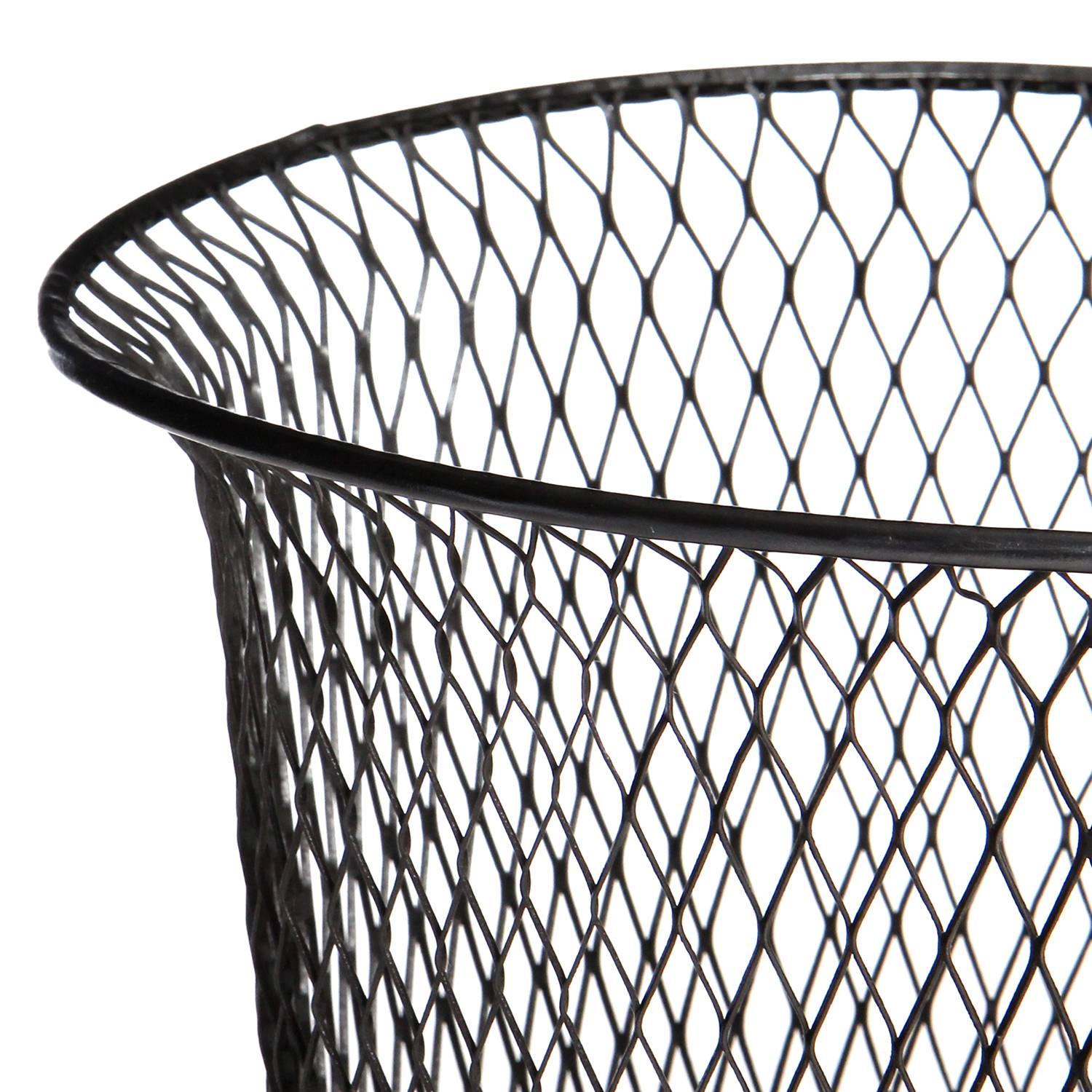 A diminutive industrial waste basket crafted of stamped steel and braided and patinated steel wire, having a subtle flared top.