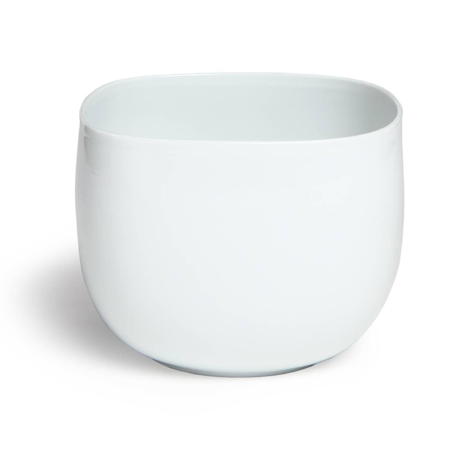 A beautiful and simple tall walled bowl made of pure white porcelain.