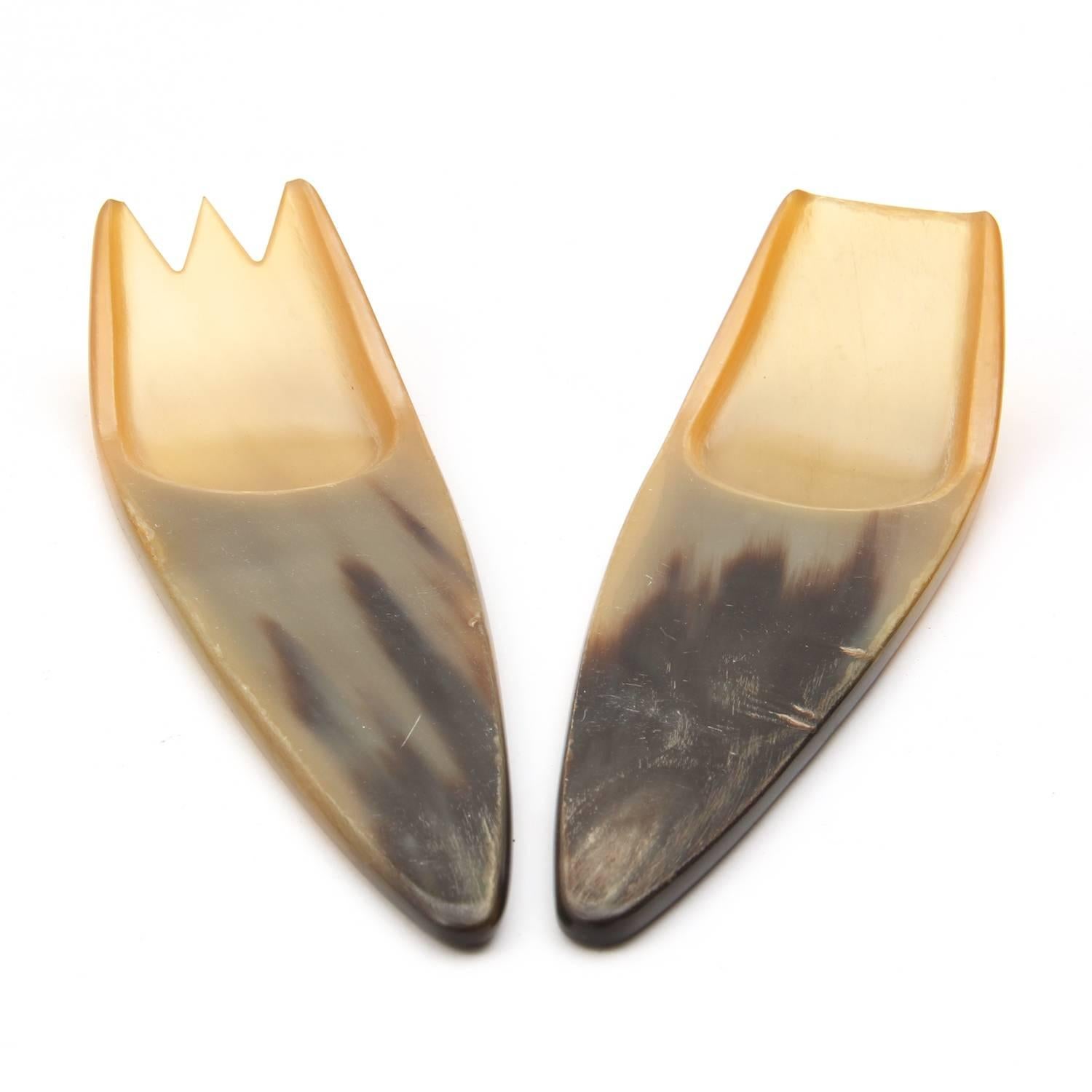 A rare pair of hand carved horn salad servers by Carl Aubock. Made in Austria, circa 1950s.