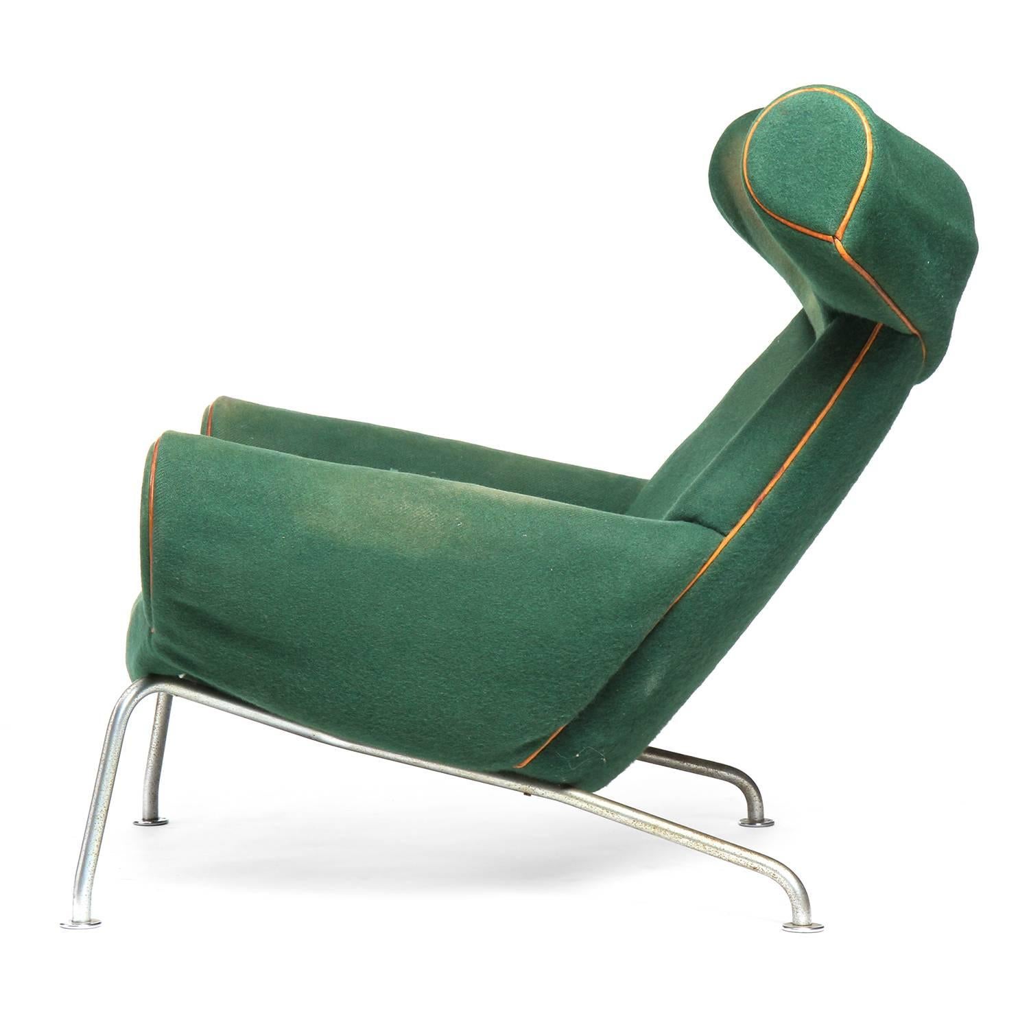 A comfortable and stately Ox lounge chair having a generous head rest and seat; perched atop chromed steel tubular legs. The chair was born from Wegner's fascination with the art of Pablo Picasso.