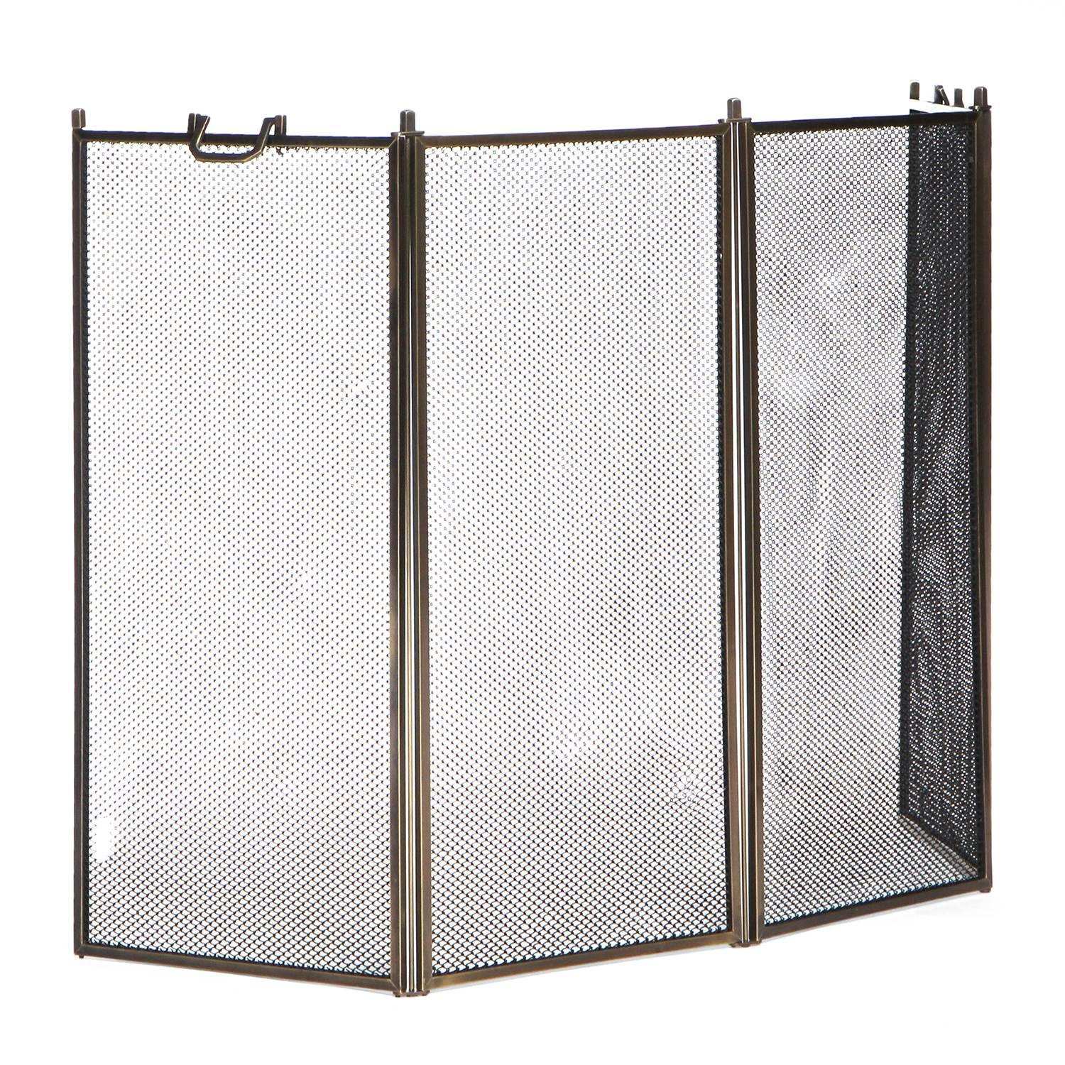 A spare and elegant fire screen having four hinged sections well-crafted of square-gauge brass and patinated steel mesh.