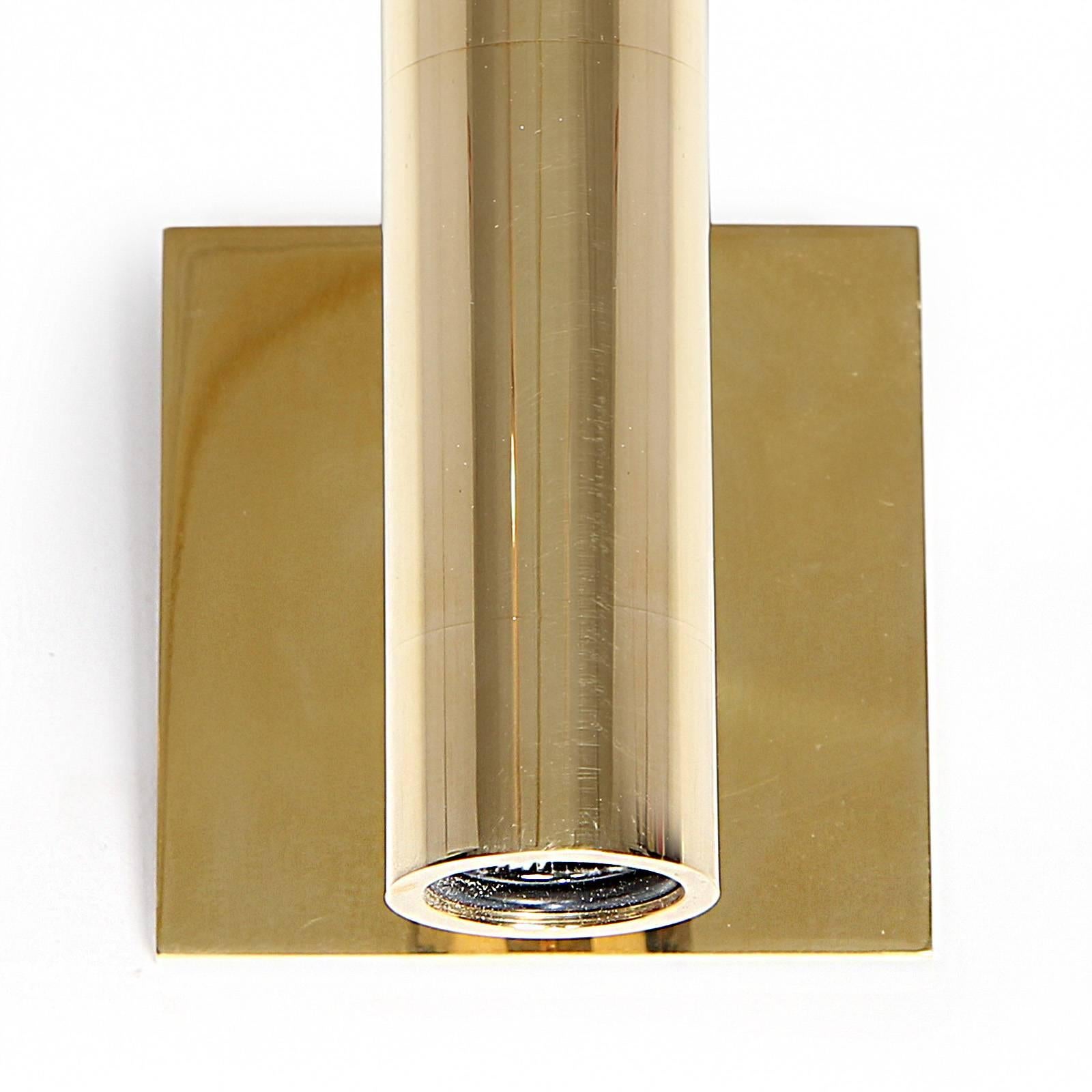 A Wyeth original Minimalist wall light in heavy gauge polished brass having a cylinder floating in front of a square wall plate. Available in polished, brushed, patinated or blackened finishes. Lead time 4-8 weeks. Made by the Wyeth Workshop in