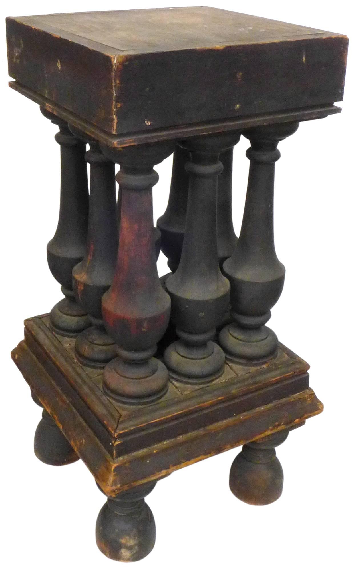 An extraordinary, turned-wood, Victorian stand. An alluring and curious construction in every aspect. A group of nine turned-wood posts holding a hefty surface; standing on four turned-wood legs. Great character with unusual scale and proportions.