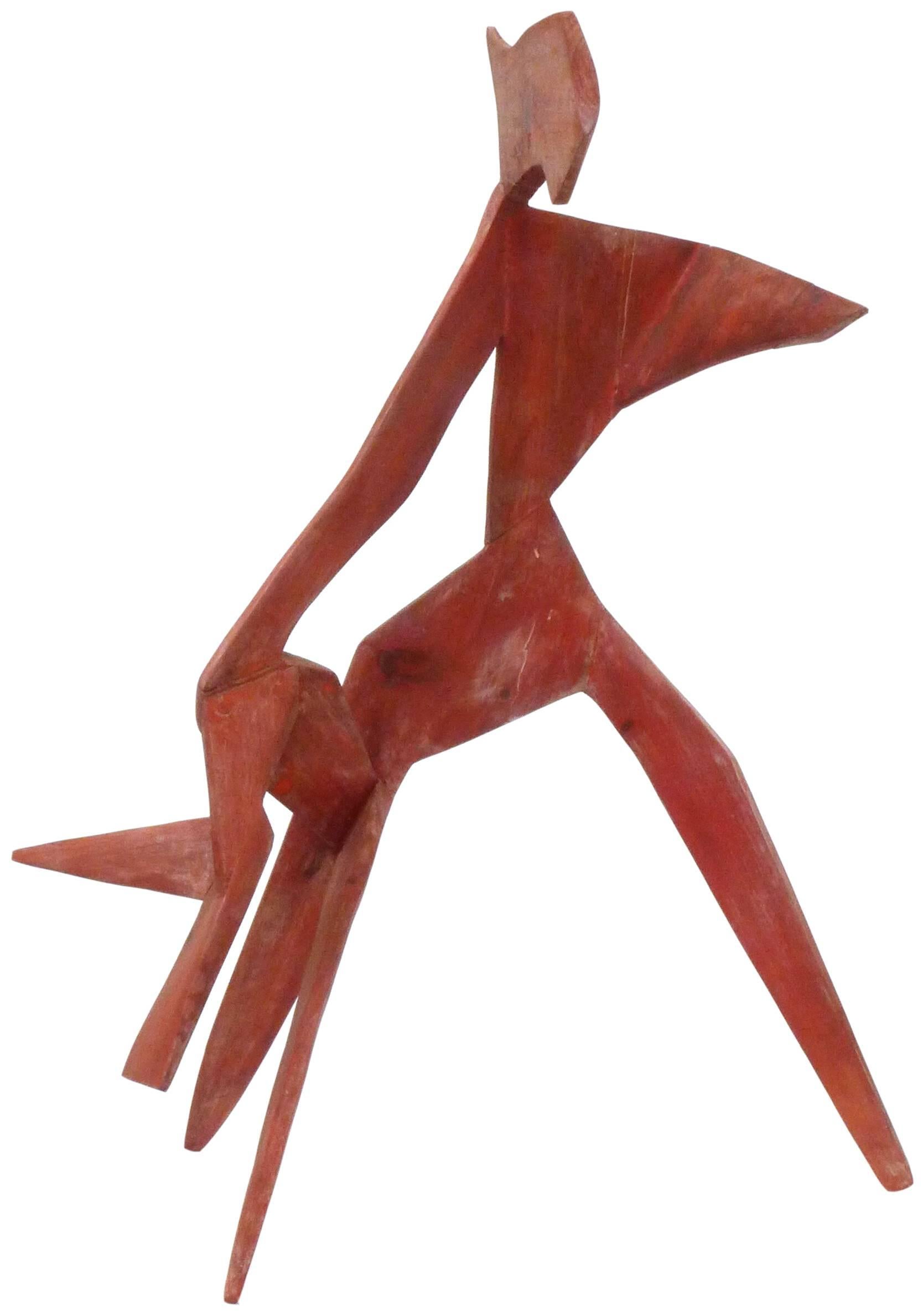 A spectacular, modernist, abstract wood sculpture. Interestingly, both carved and dowel-construction assembled, a fantastic creature-like, anthropomorphic and expressive form exhibiting great gesture and geometry from all angles, a wonderful sense