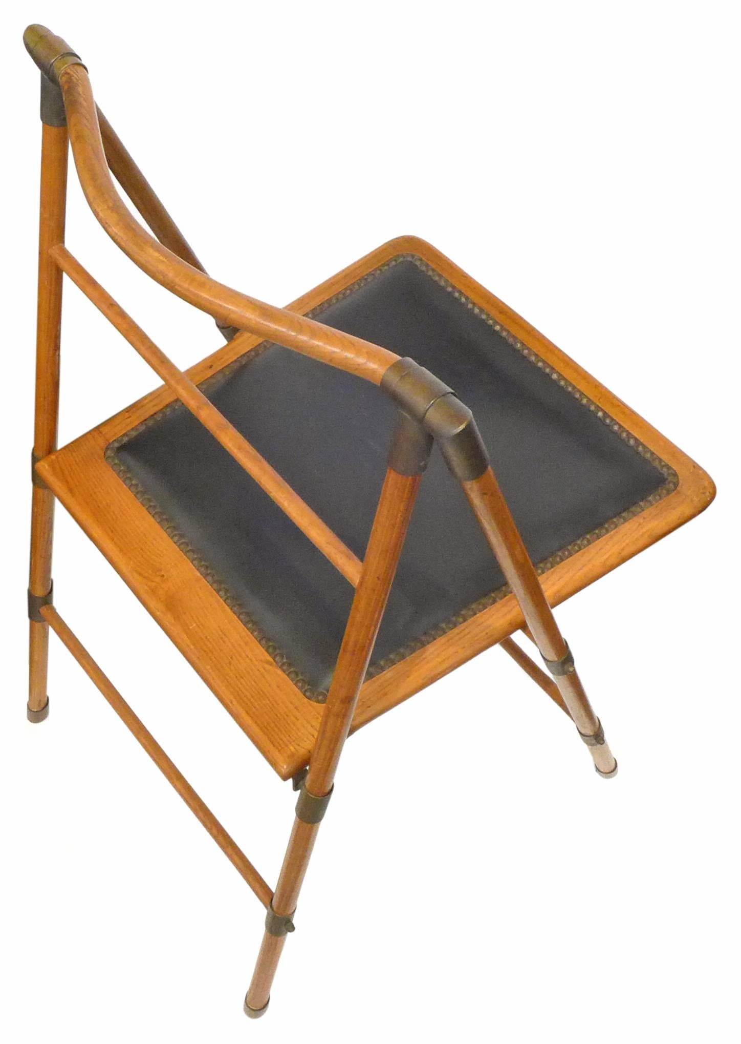 Late 20th Century Wood and Brass Campaign Chair
