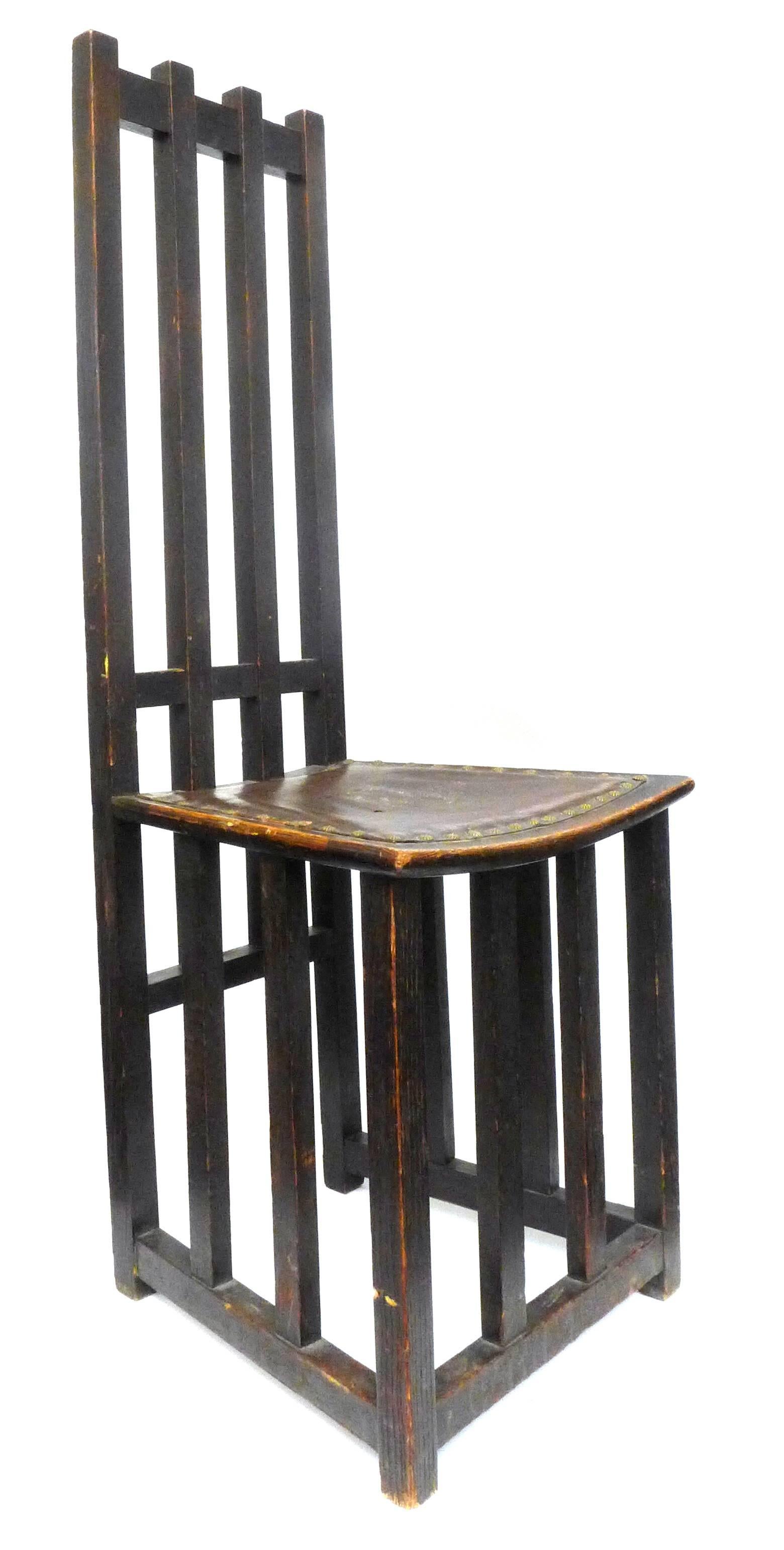 A wonderful, wood Arts & Craft high back chair. An austere yet alluringly artful, architectural article, thoughtfully designed and expertly mortise-and-tenon constructed. Minimalist and very modern with captivating repeating lines and a rectilinear