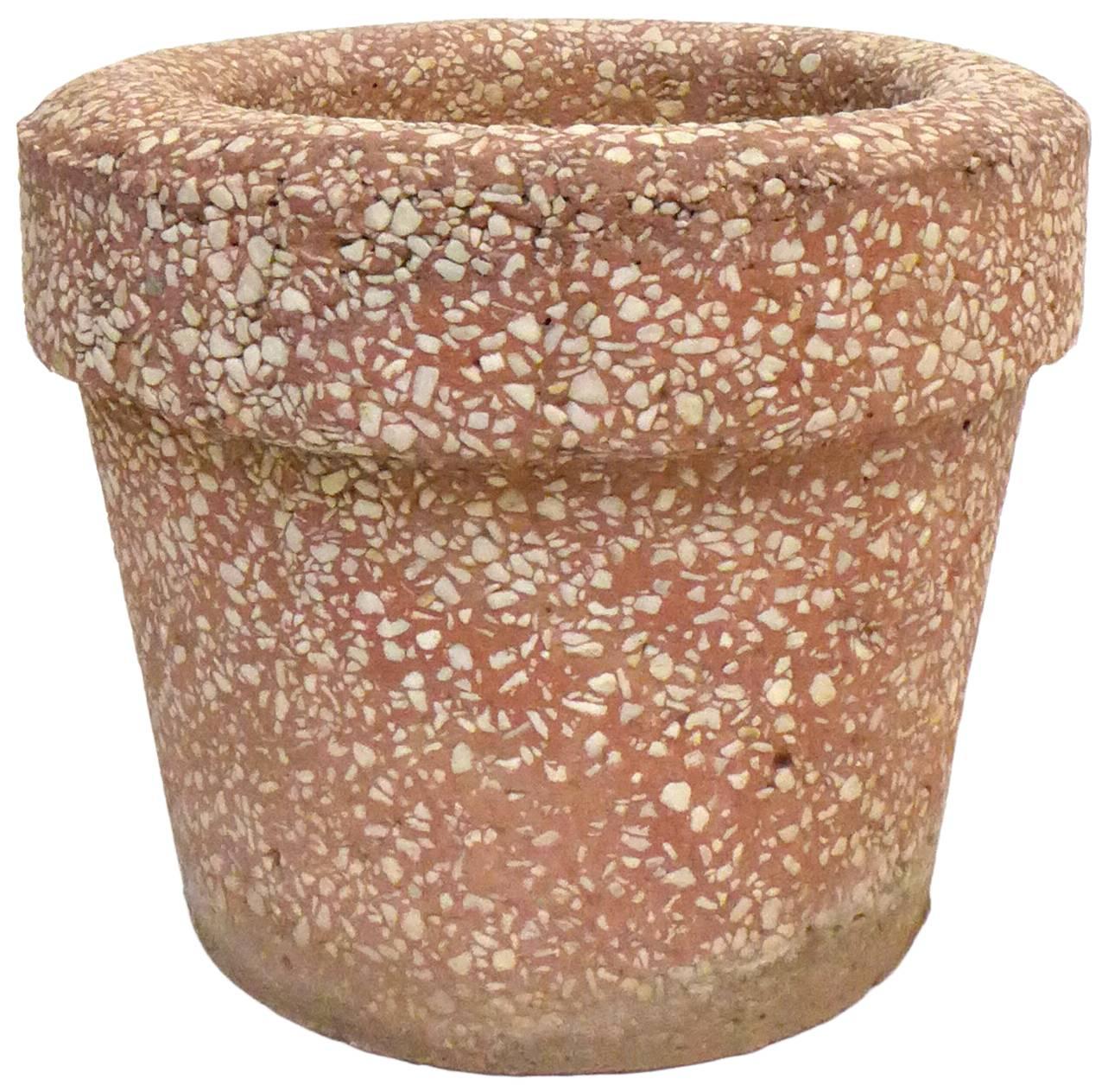 A wonderful trio of cast terrazzo planters. A classic planter form in a great, unexpected, chunky scale and material. Each planter wearing individual, much-desired patina from some life outdoors. A fantastic grouping of decorative botanical buddies,