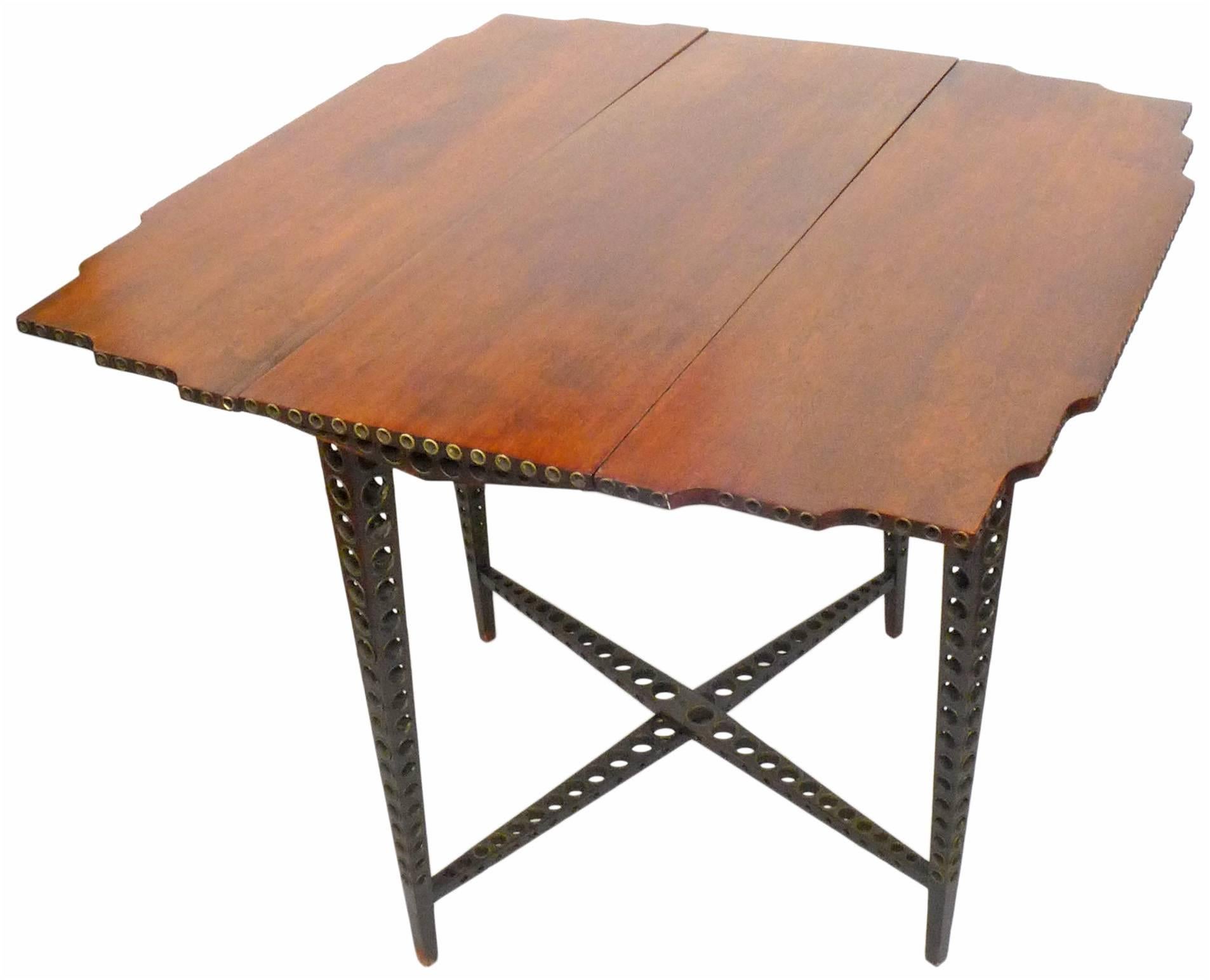 American Early 20th Century Drop-Leaf Wood and Brass-Grommet Table For Sale