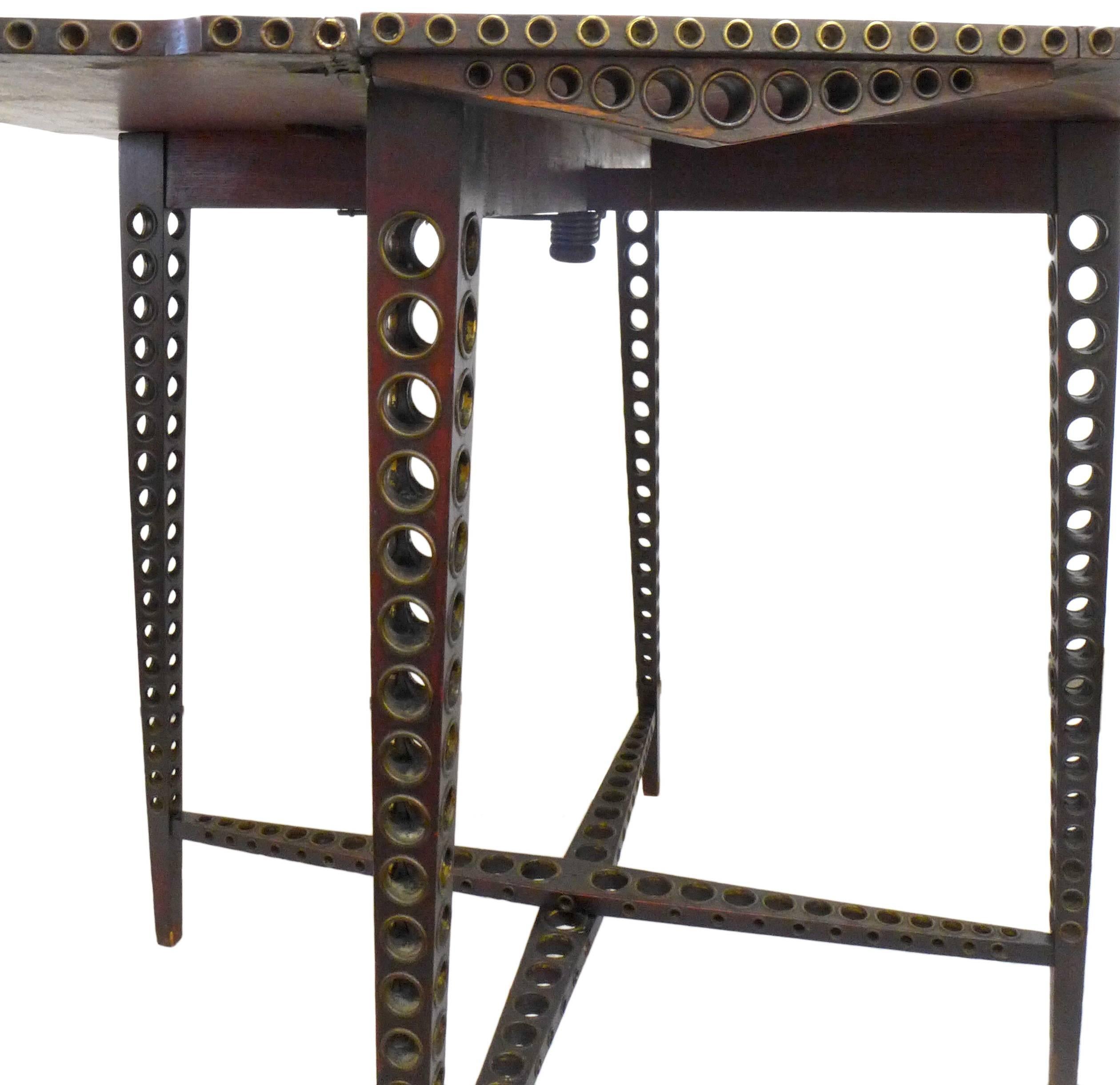 Early 20th Century Drop-Leaf Wood and Brass-Grommet Table In Good Condition For Sale In Los Angeles, CA