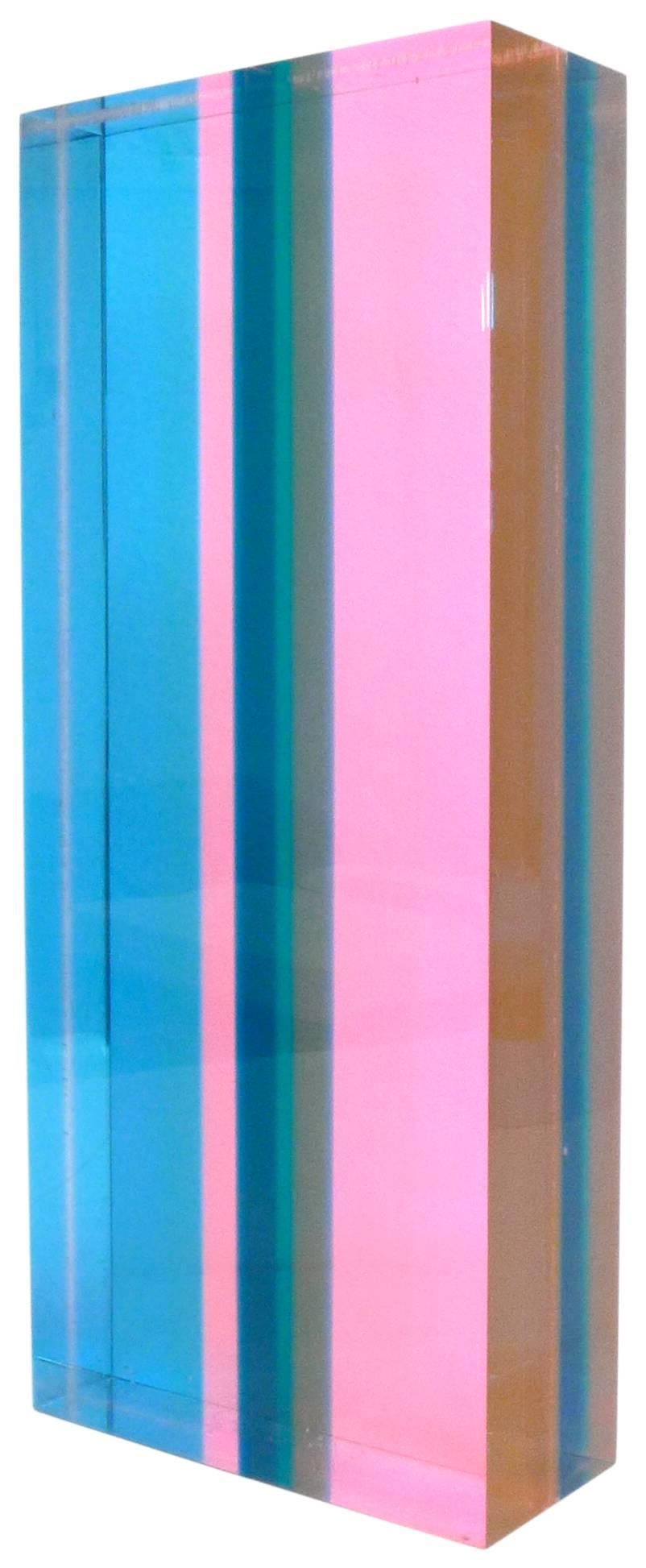 A fantastic, laminated-Lucite sculpture by Los-Angeles-based artist Vasa Mihich. A kaleidoscopic, mini-monolith; vibrant hues overlap and blend as one's vantage point changes. Enticing from all angles and even encourages one to hold and behold, an