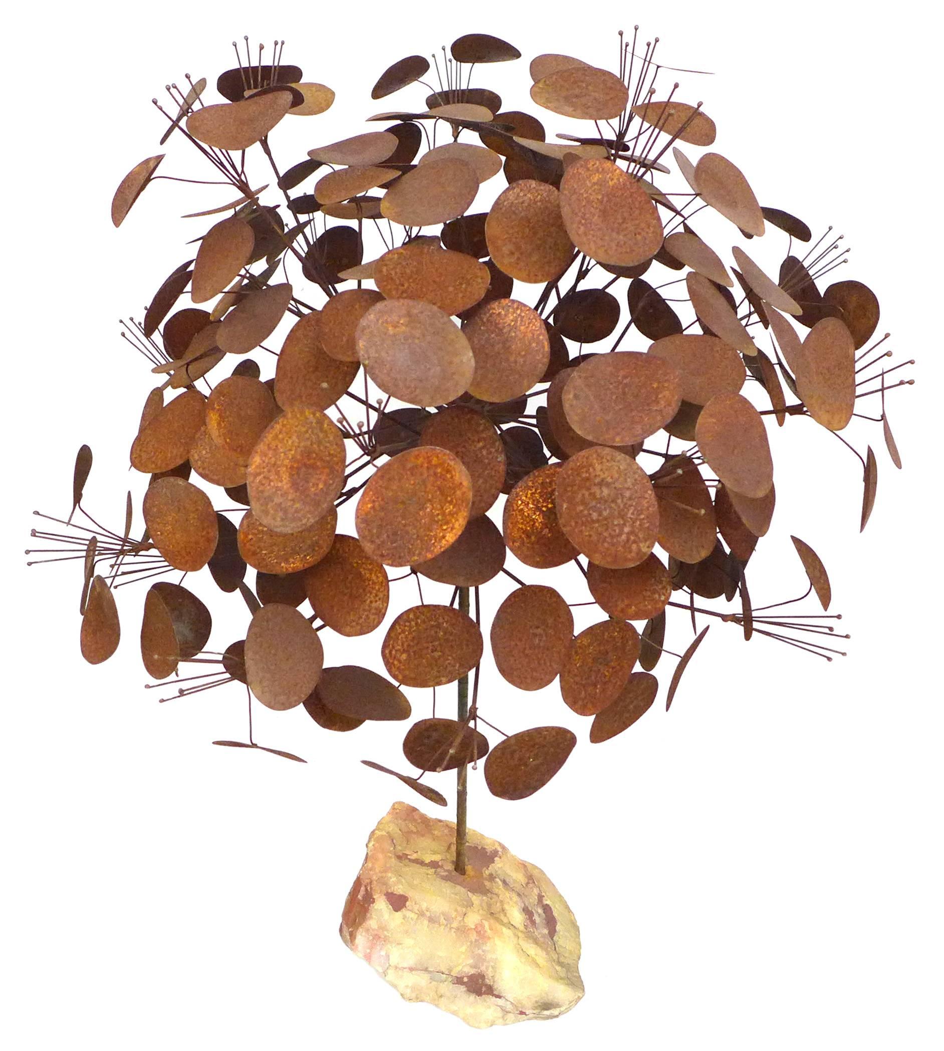 A beautiful and impressive sculptural work by Curtis Jere. A large money tree form with a spectacular patina; years of outdoor living have provided an extraordinary and warm surface due to oxidation of the brass-plated leaf forms. An unusually